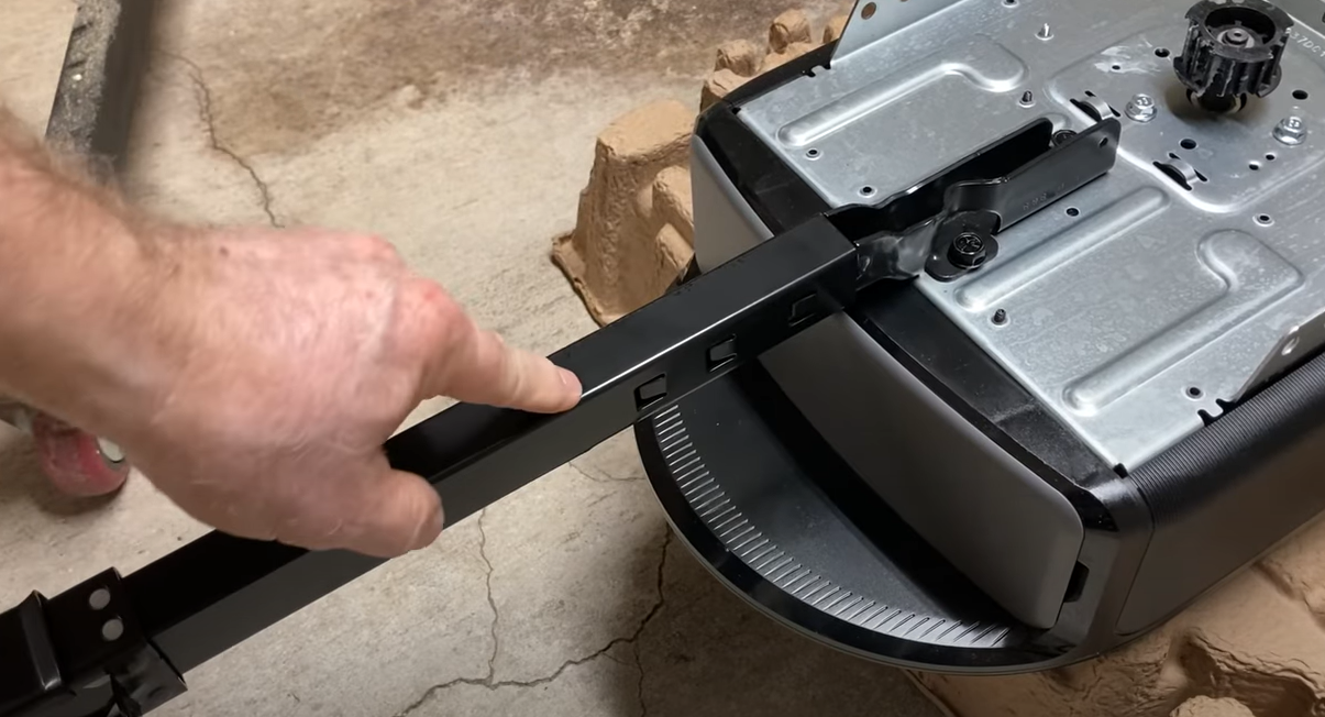 Garage door technician repairing a garage door opener in Punta Gorda, FL for Local Garage Door Repair services