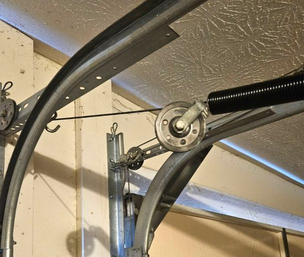 Off-Track Door Realignment & Cable Repair